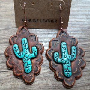 real leather earrings new catus never worn as is